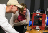 Professor and student working together on research