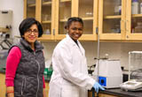 Professor and student working together on research