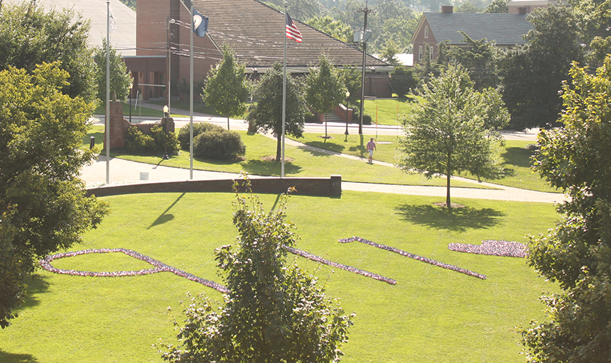 flags placed on Back Quad in shape of 9-11 with heart