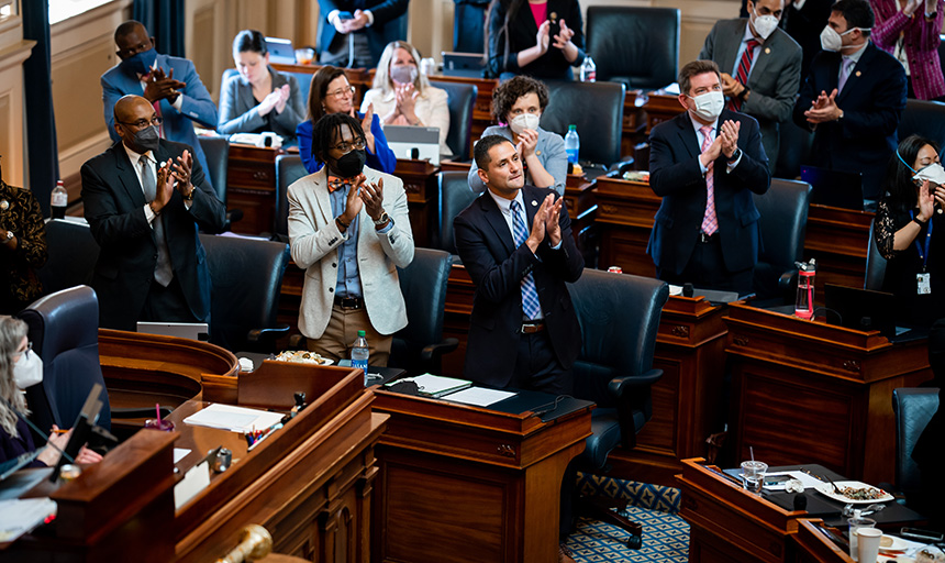 Members of the Virginia House of Delegates applaud President Maxey