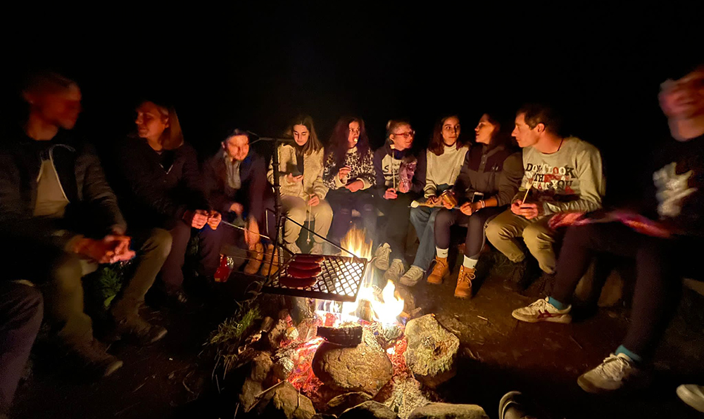 people around a campfire