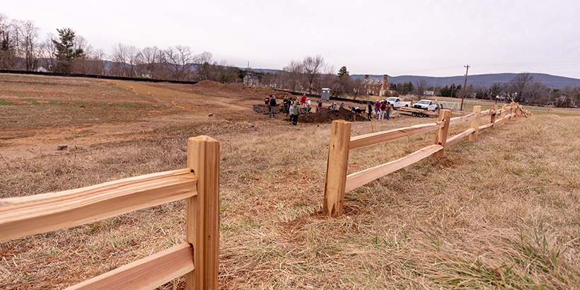 Picture of finished wooden fence built during service project
