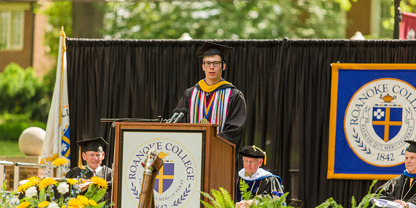 Matthew Johnson giving a speech as co-valedictorian