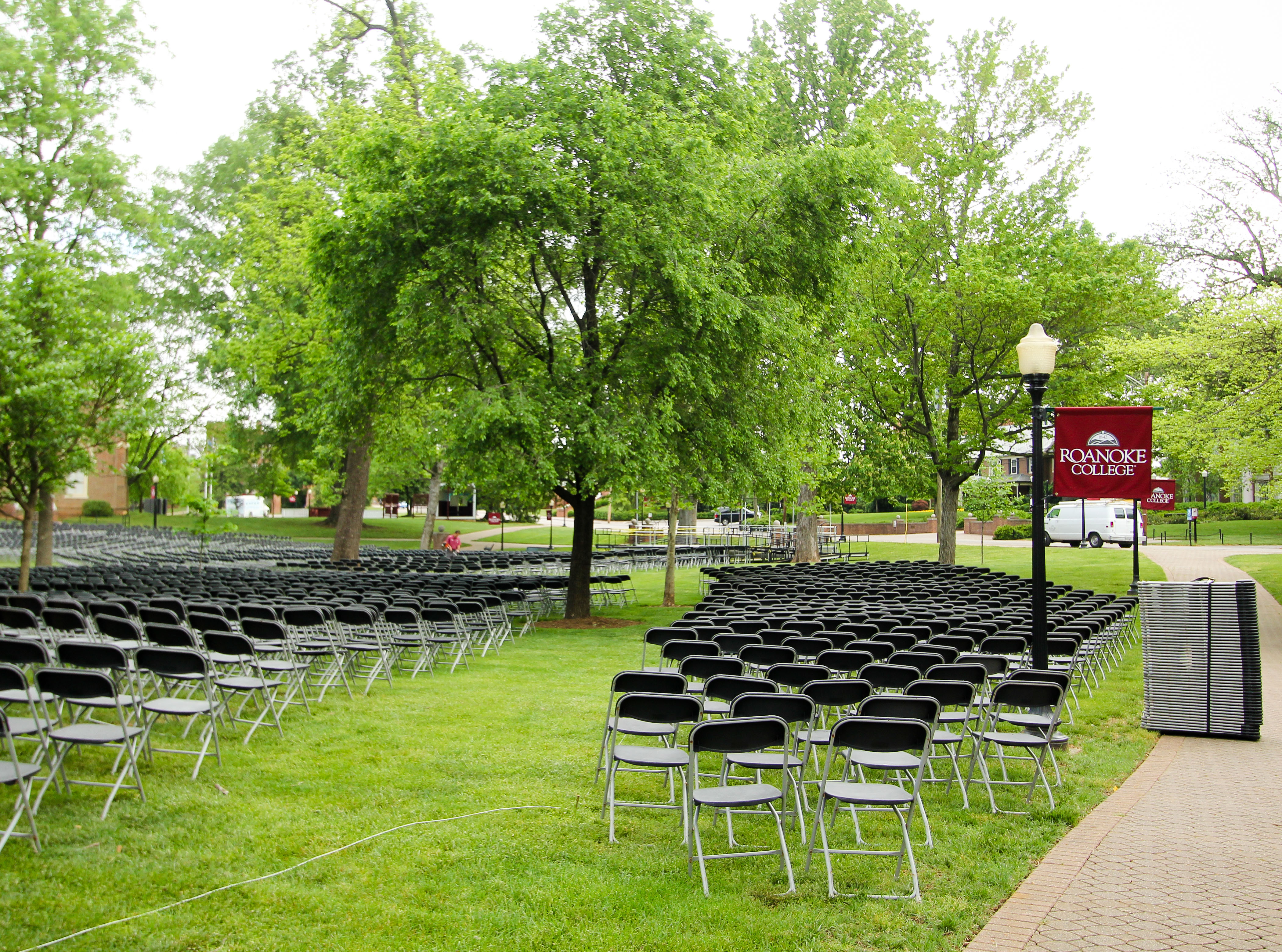 Empty chairs set up on the back quad