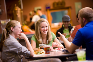 students eating in the cavern