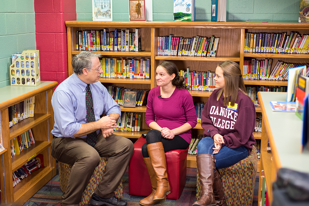 Chuck Lionberger interviewing teacher and student Natalie Slemp