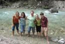 students in a natural pool of water