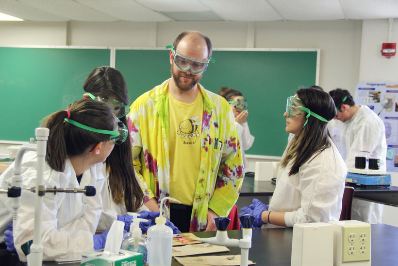 Students with their professor during a lab