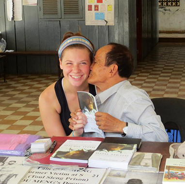 Student with an author from Cambodia