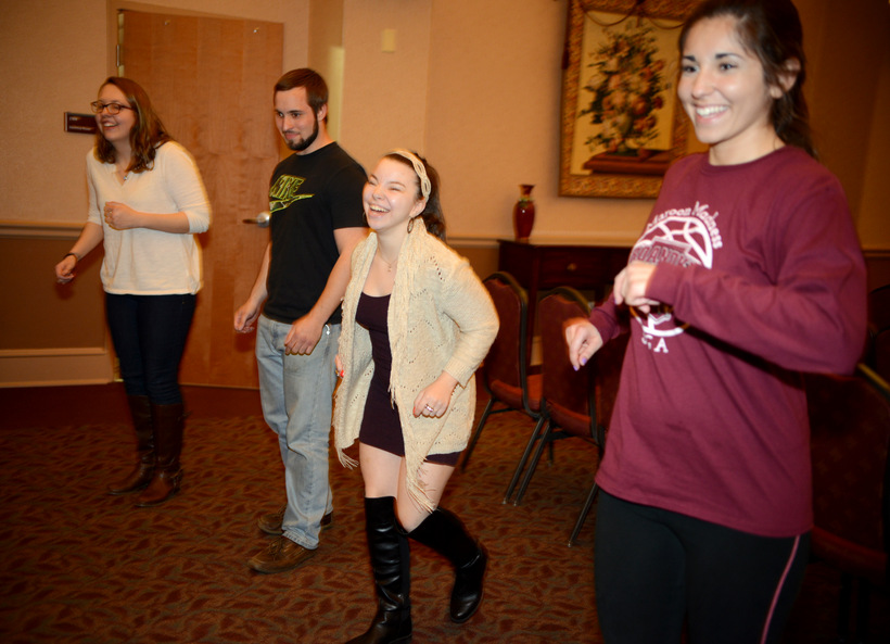 Students participating in an activity at the Gender and Women's Studies Forum