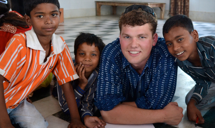 Student with Indian children