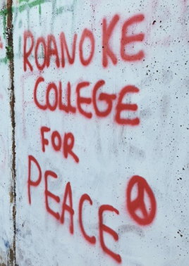 Roanoke College For Peace spray painted on The Rock