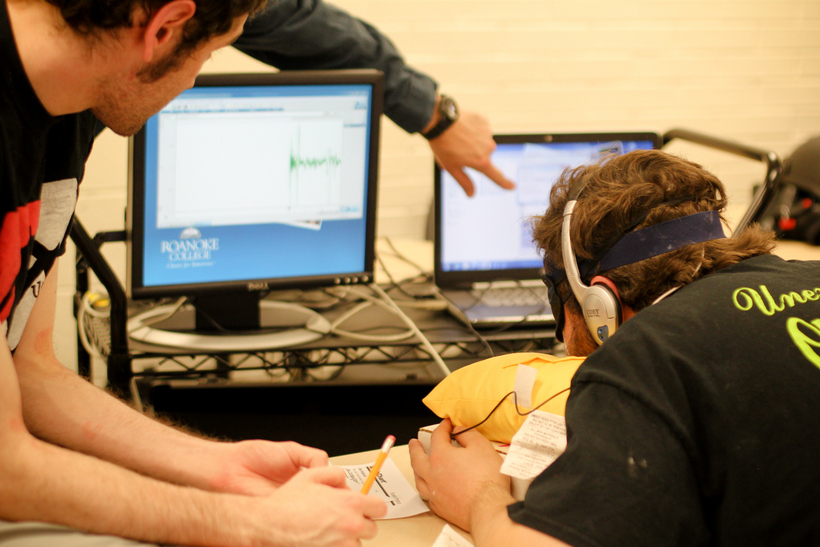 Students working at computers for an experiment