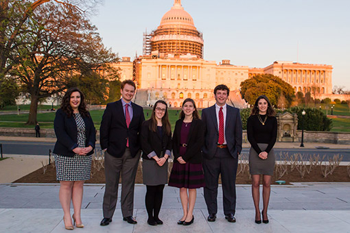 students on Washington Semester posing in front of Capital Building
